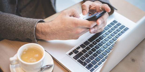 A cafe owner in Vienna is fed up with tourists coming in and spending too long charging their phones and laptops. Photo / Getty Images