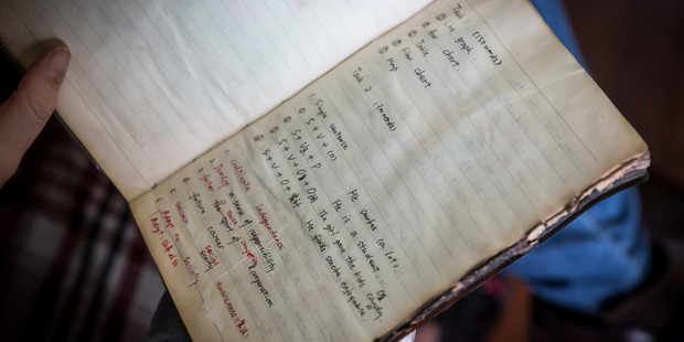 The notebook of Hui Yun Tu, 22, was found with her body in the rubble of the CTV building. She was learning English and it shows her translations up until February 22. Photo / Mike Scott