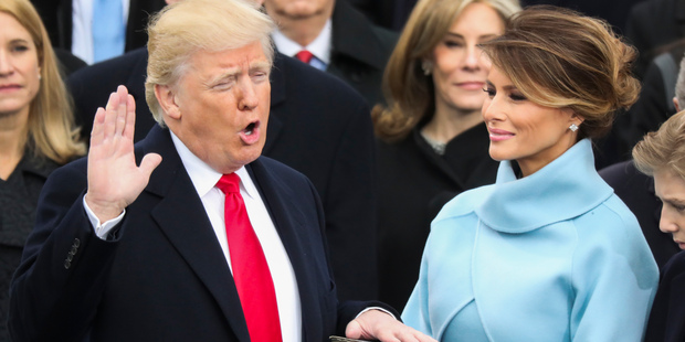 Jan. 20, 2017: Donald Trump being sworn in as the 45th president of the United States as Melania Trump looks on. Photo / AP