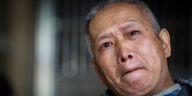 Bo Tu, in his Wuhan home, remains broken hearted at the loss of his only daughter Hui Yun Tu, 22, in the CTV building collapse. Photo / Mike Scott