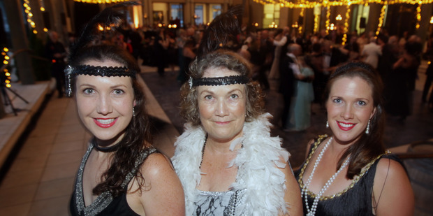 BALL GOERS: Hannah Stockwell (left), Judy Stockwell, and Melody Billman all dolled up for the Art Deco Black Tie Ball at the Hawke's Bay opera House Plaza in Hastings last night. PHOTO/PAUL TAYLOR.