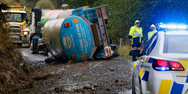 A milk tanker trailer tipped over on Paradise Road, near Tangowahine. Photo / John Stone