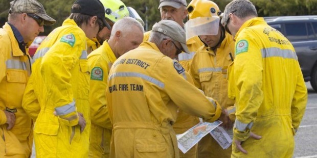 Fire crews plan their next move tackling the massive wildfire burning on Christchurch's Port Hills. Photo / Christchurch City Council