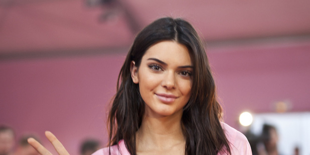Kendall Jenner recently painted her living room a shade of Baker-Miller pink. Conveniently, here she is wearing pink at the 2016 Victoria's Secret show. Photo / Getty Images