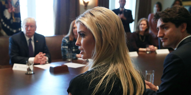 US President Donald Trump, Canadian Prime Minister Justin Trudeau listen to Ivanka Trump, speak during a roundtable discussion. Photo / Getty