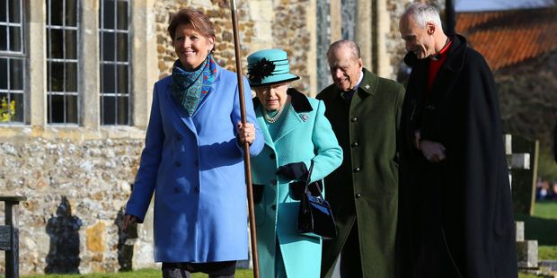 Britain's Queen Elizabeth II and her husband Duke of Edinburgh, centre, arrive at St Peter and St Paul at West Newton. Photo / AP