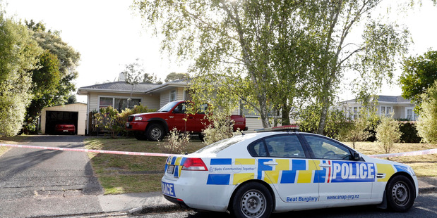 A property on Clark Rd was cordoned off after five people were injured in a gang-related shooting. PHOTO/JOHN STONE.