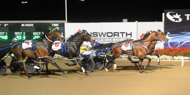 Lennytheshark (6) outpaces Smolda and Lazarus (8) in the A$750k Miracle Mile at Menangle on Saturday night.