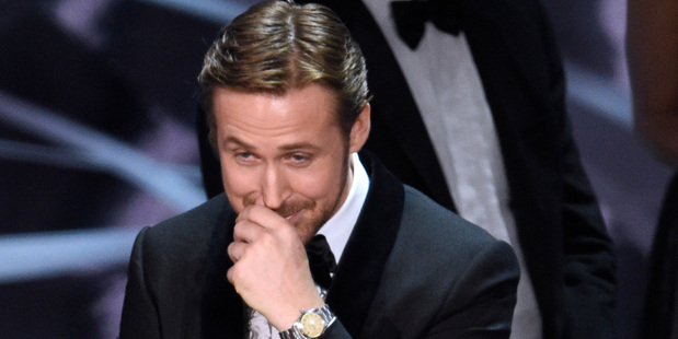 Ryan Gosling reacts as the true winner of best picture is announced at the Oscars. Photo/AP