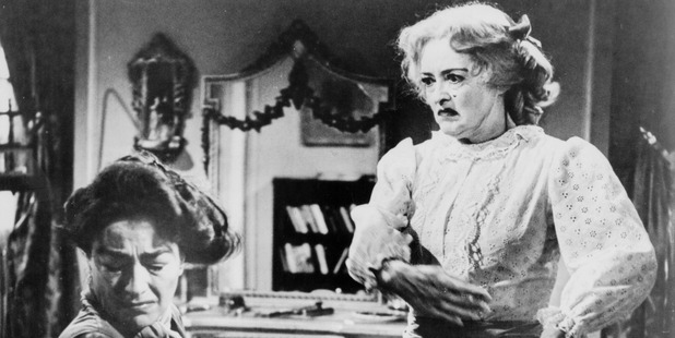Screen legends Bette Davis and Joan Crawford face off in Robert Aldrich's unsettling 1962 melodrama, Whatever Happened to Baby Jane.