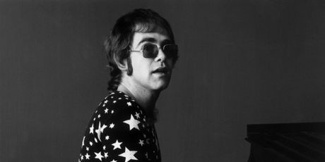 7th November 1970: Portrait of British-born musician Elton John playing piano. Photo /Getty 