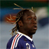 France's Bacary Sagna opts for a head of overgrown maggots in lieu of actual hair. Photo / AP.
