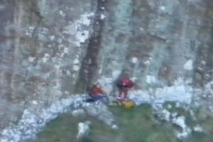 A still from footage of the rescue of climber Andrew McWilliam. Photo / supplied
