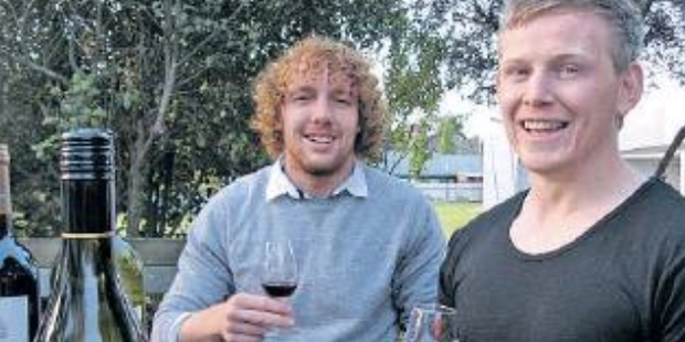 Christopher Bonifacio and Ben Tombs savour a taste of Hawke's Bay merlot.