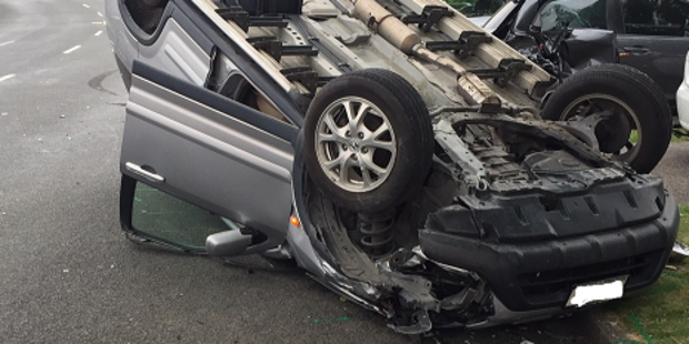 The car flipped landing on its roof. Photo / Cambridge Police Facebook