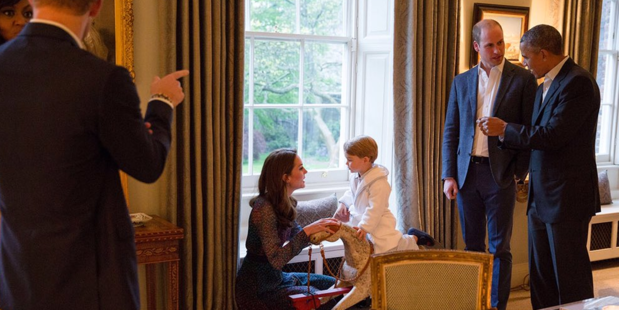 Prince George immediately charmed the Obamas by playing on a rocking horse given to him by them for his first birthday. Photos: @KensingtonRoyal / Twitter