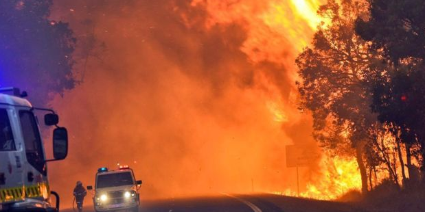 At least 95 homes were destroyed, along with many historic buildings. Photo / Twitter