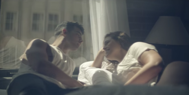 Joe Jonas and Ashley Graham in the video clip for DNCE's hit, Toothbrush
