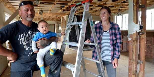 Skip King, partner Anna Smythe and baby Taika King, of Dunedin, have been overwhelmed with community support. Photo / Stephen Jaquiery