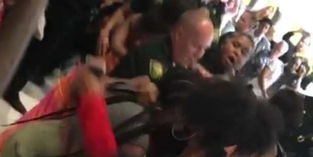 Police arrested three people at Fort Lauderdale-Hollywood International Airport after a riot broke out over cancelled flights. Photo / Instagram, kallejero