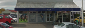 A weapon was used and a sum of cash taken during the robbery at the TAB on Heretaunga St in St Leonards. Photo/Google Maps