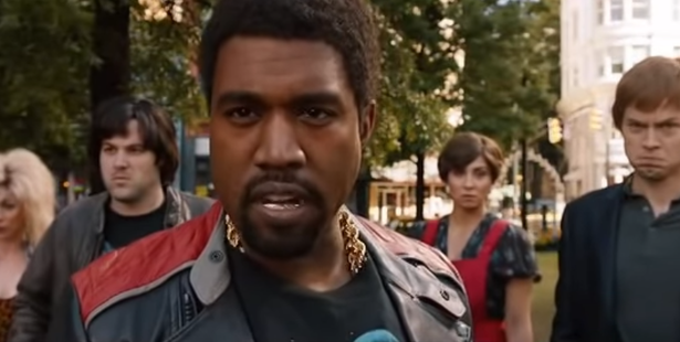 Kanye West in character as a MTV VJ during Anchorman 2's fight scene. Photo/YouTube