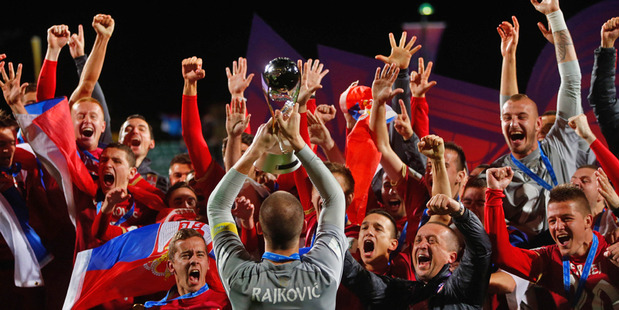 Predrag Rajkovic of Serbia holds up the trophy following the FIFA U-20 World Cup Final match between Brazil and Serbia. Photo / Getty