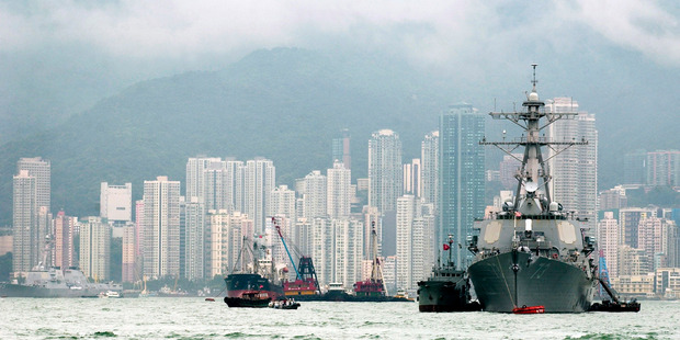 In Hong Kong harbor, the guided-missile destroyer USS Decatur rests at anchor during a three-day port call in December 2004. Photo / The Washington Post