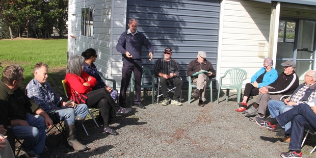 EXCITING TIMES: Mayor John Carter outlining his woodworking skills at the opening of Kaitaia's Menzshed.