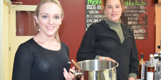 Hollie Mackie and Paige Searancke will be filling saucepans and bellies with hot warming soup at the Well Cafe on Sunday evenings.