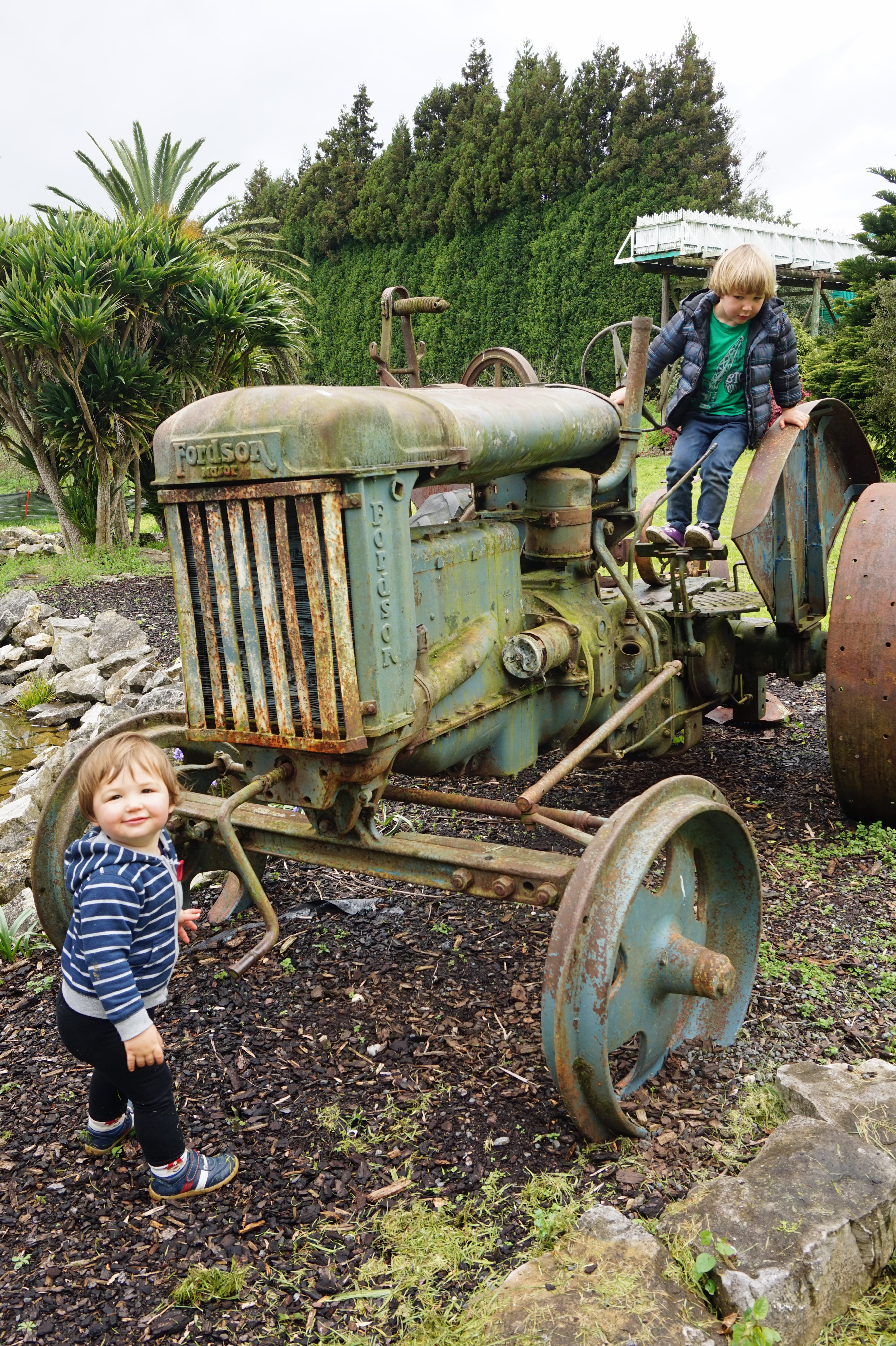 Luke and Bryn Harvey enjoy themselves in the gardens at Waitomo Homestead. Photo / Eveline Harvey
