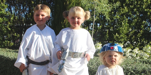 THE LIGHT SIDE: The force was strong with siblings Zak (Luke), Kate (Leia) and Lacey (R2D2)