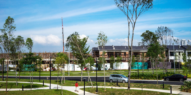 Houses stand under construction at the Estauri Gardens project in Nusajaya, Johor, Malaysia. Photo / Sanjit Das