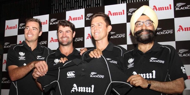 Black Caps Tim Southee (left), Colin de Grandhomme and Trent Boult with R.S. Sodhi, managing director of Gujarat Co-operative Milk Marketing Federation. Photo / Amul.Coop Twitter