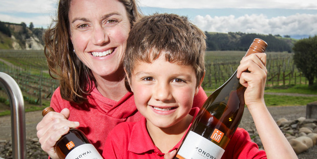 TRIPLE GOLD: Monowai owner and winemaker Emma Lowe and her son Lucas Nunez-Lowe, 6, are thrilled to have won three gold medals at the New York International Wine Competition 2017. Photo/Paul Taylor