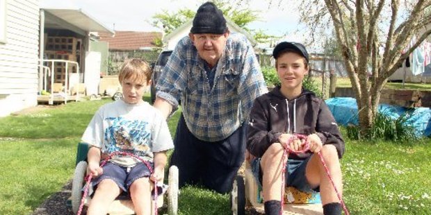 Menzshed member Bill Were with 9-year-old Liam Arthur (left) and Ben Monkley, 13.