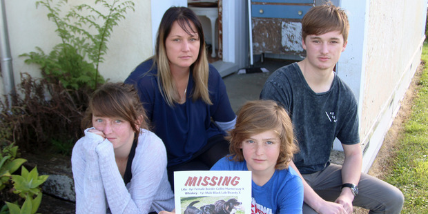 Lochlan, right, Zoe, left, Preston (holding poster) and their mother Angela.