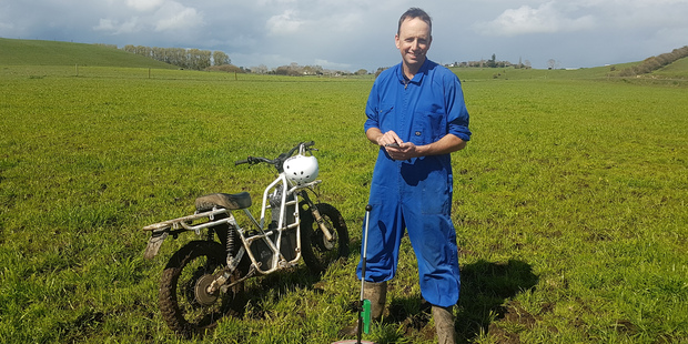 Grant Coombes with one of his electric motorbikes which will replace his quad bikes.