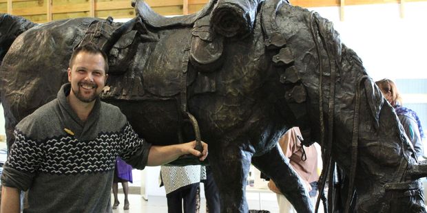 Artist Matt Gauldie with the finished war horse statute. Photo / Tom Rowland