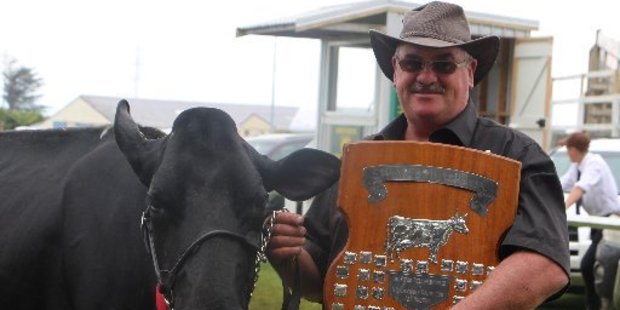 Ross Johnson with Hastie Spring Fever Capri, who won Premier Cow (all breeds) on Sunday.