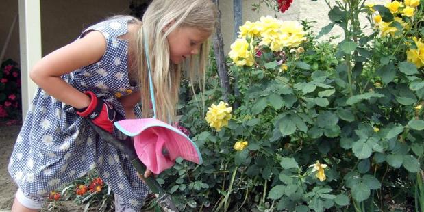 Roxburgh Area School pupil Alexina Ballantine (8) was the youngest to get dirty and help clean out one Tweed St property.