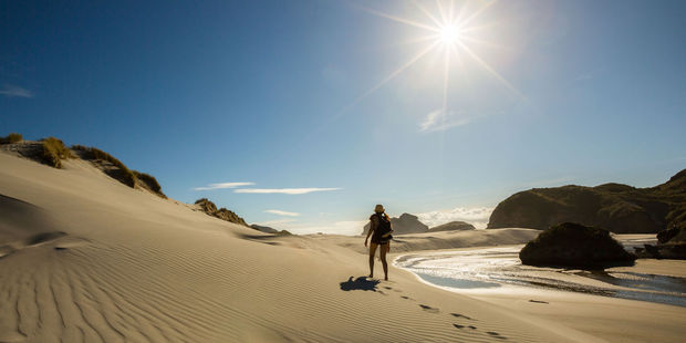 Wharariki Beach, west of Cape Farewell in the South Island. Nelson, Tasman and Marlborough locals count themselves as the most beach-going people in New Zealand, according to a survey. Photo / 123RF