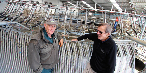 Newly retired NRC farm monitoring manager Dennis Wright (right) with Ngararatunua dairy farm Ken Finlayson, who has hugely reduced both water usage and effluent.