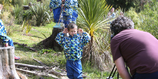 Four-year-old Caleb Campbell has his few moments of fame. Photo/John Stone