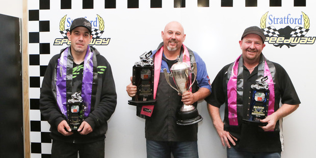 The New Zealand Modified Championship winners have their moment of glory on the podium. pictured from left - Shaun Bloeman (3rd) Jamie Fox (1st) and Richard Pierce (2nd).