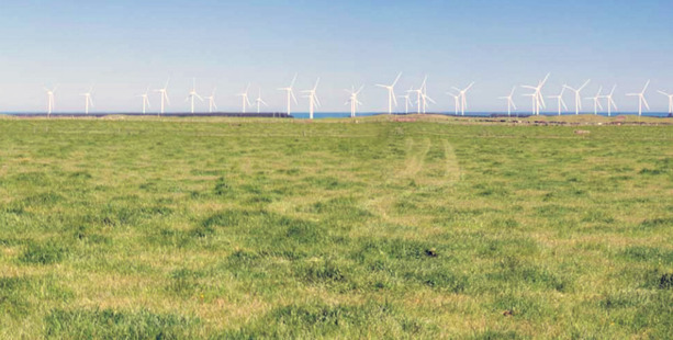 Wind turbines on coastal land near Waverley could look like this from SH3. Graphic / supplied