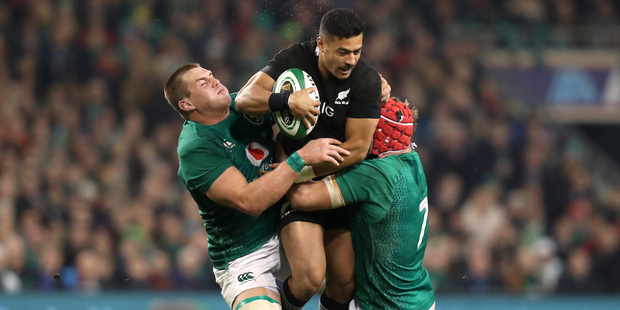 Ireland's CJ Stander and Josh van der Flier tackle New Zealand's Richie Mo'unga. Photo / Photosport