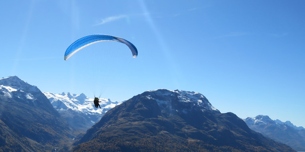 Hang-gliders at the top of Muottas Muragl.