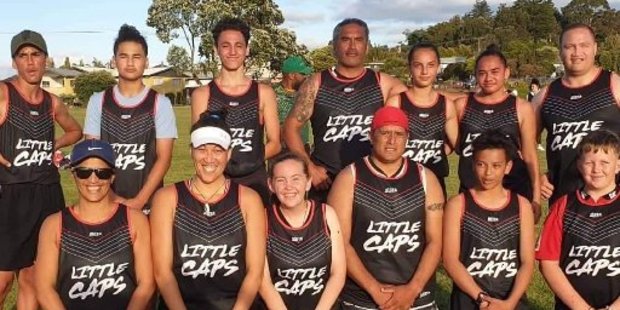 Lil Caps won the Top Field Touch Module social division on Tuesday night. From left are, Nikau Marsden, Ihaia Te Wara, Eli, Steve Marsden (team trainer), Maani Marsden, Eliza Marsden, Taupaki Marsden (team trainer), Hinerangi Waikai (manager), Rowie Tatana, Shayla Wallace, Carlos Waikai (coach), True Waikai (captain) and Caolan Price. Photo / supplied