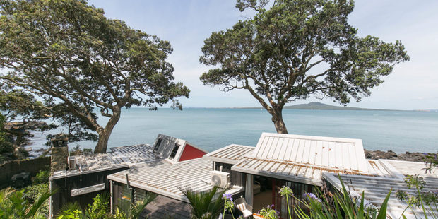 Pohutakawa flank the Chapple House.